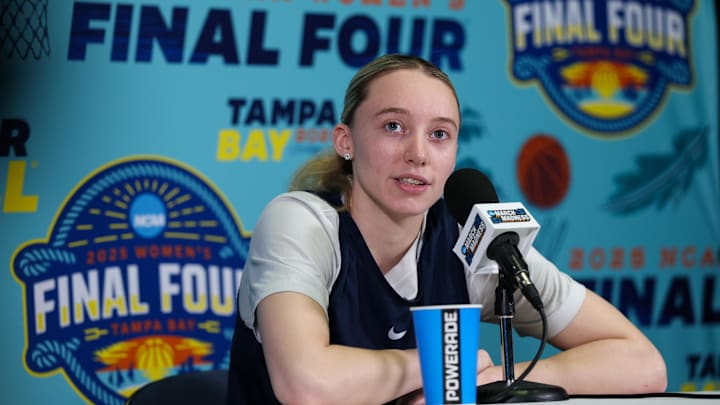 Apr 3, 2025; Tampa, FL, USA; UConn Huskies guard Paige Bueckers (5) talks to media before the NCAA Woman’s Final Four at Amalie Arena. Mandatory Credit: Nathan Ray Seebeck-Imagn Images