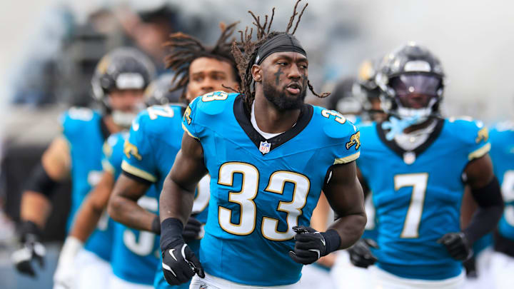 Jacksonville Jaguars linebacker Devin Lloyd (33) runs on the field before an NFL football matchup Sunday, Dec. 15, 2024 at EverBank Stadium in Jacksonville, Fla. [Corey Perrine/Florida Times-Union]