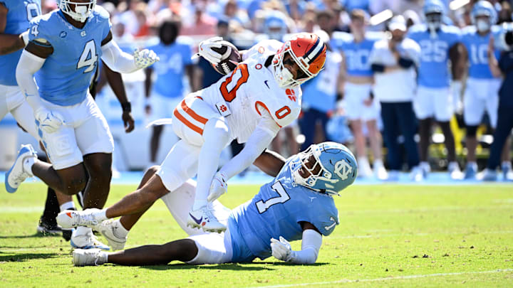 Khmori House of North Carolina tries to bring down Clemson wide receiver Antonio Williams in Saturday's game. Khmori House of North Carolina tries to bring down Clemson wide receiver Antonio Williams in Saturday's game.