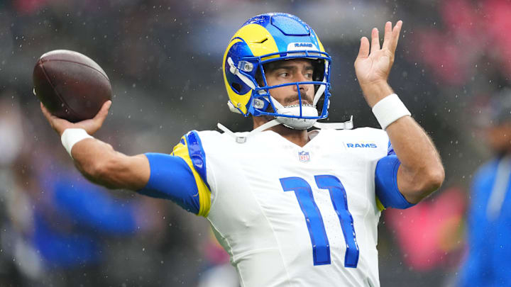 Oct 19, 2025; London, United Kingdom; Los Angeles Rams quarterback Jimmy Garoppolo (11) warms up before a NFL International Series game between the Los Angeles Rams and the Jacksonville Jaguars at Wembley Stadium. Mandatory Credit: Kirby Lee-Imagn Images