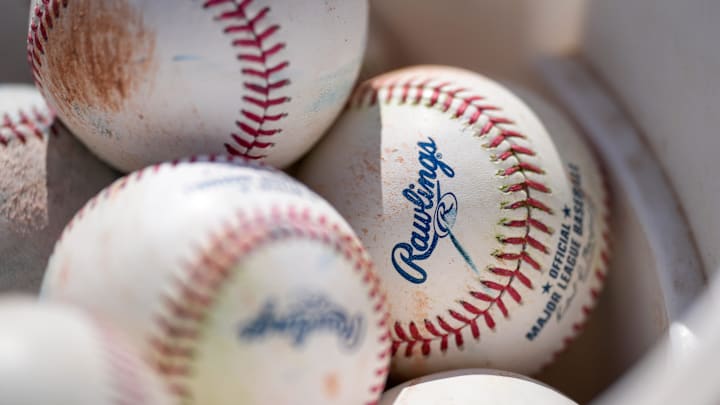 Practice baseballs are stored in buckets at the Cincinnati Reds Player Development Complex in Goodyear, Ariz., on Friday, Feb. 14, 2025.