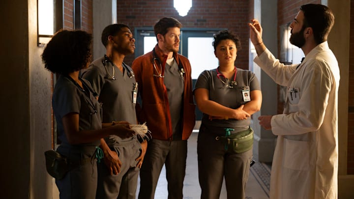 BRILLIANT MINDS -- "The Blackout Bride" Episode 104 -- Pictured: (l-r) Ashleigh LaThrop as Dr. Ericka Kinney, Spence Moore II as Dr. Jacob Nash, Alex MacNicoll as Dr. Van Markus, Aury Krebs as Dr. Dana Dang, Zachary Quinto as Dr. Oliver Wolf