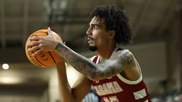 Alabama guard Houston Mallette (95) shoots the ball against North Dakota at Betty Engelstad Sioux Center in Grand Forks, ND on Wednesday, Dec 18, 2024.