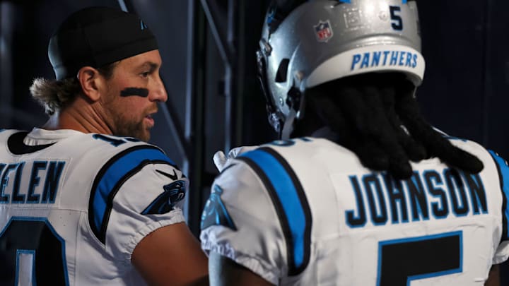 CHARLOTTE, NORTH CAROLINA - SEPTEMBER 15: Adam Thielen #19 and Diontae Johnson #5 of the Carolina Panthers walk in the tunnel prior to a game against the Los Angeles Chargers at Bank of America Stadium on September 15, 2024 in Charlotte, North Carolina. The Chargers defeated the Panthers 26-3. CHARLOTTE, NORTH CAROLINA - SEPTEMBER 15: Adam Thielen #19 and Diontae Johnson #5 of the Carolina Panthers walk in the tunnel prior to a game against the Los Angeles Chargers at Bank of America Stadium on September 15, 2024 in Charlotte, North Carolina. The Chargers defeated the Panthers 26-3.