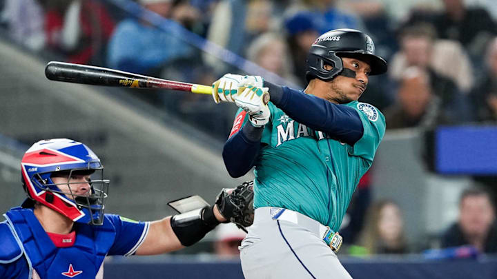 Oct 13, 2025; Toronto, Ontario, CAN; Seattle Mariners infielder Jorge Polanco (7) singles in the seventh inning against the Toronto Blue Jays during game two of the ALCS round for the 2025 MLB playoffs at Rogers Centre. Mandatory Credit: Nick Turchiaro-Imagn Images Oct 13, 2025; Toronto, Ontario, CAN; Seattle Mariners infielder Jorge Polanco (7) singles in the seventh inning against the Toronto Blue Jays during game two of the ALCS round for the 2025 MLB playoffs at Rogers Centre. Mandatory Credit: Nick Turchiaro-Imagn Images