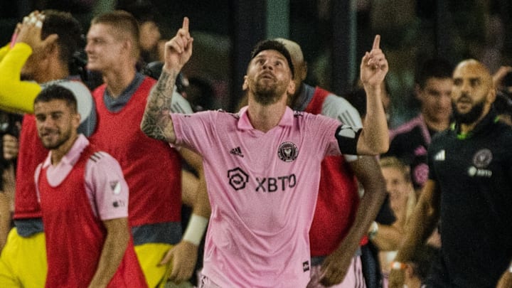 Lionel Messi celebrates after scoring the game-winning goal against Cruz Azul in his Heron debut.