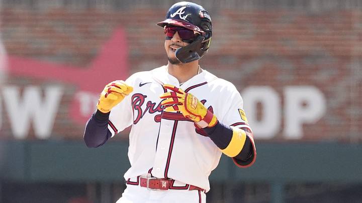 Sep 29, 2026; Cumberland, Georgia, USA;  Atlanta Braves outfielder Mauricio Dubon (14) reacts after hitting a double in the second inning during game one of the Wildcard round for the 2026 MLB Playoffs at Truist Park.  Mandatory Credit: Dale Zanine-Imagn Images