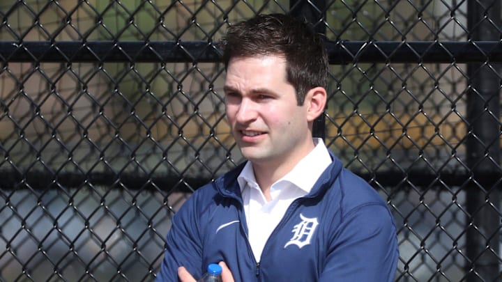Tigers president of baseball operations Scott Harris watches pitchers throw during bullpen sessions