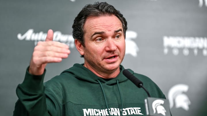 Michigan State coach Jonathan Smith talks the media on the first national signing day for college