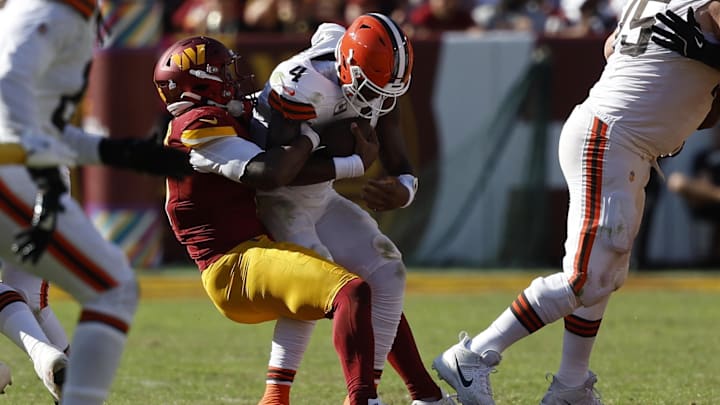 Oct 6, 2024; Landover, Maryland, USA; Cleveland Browns quarterback Deshaun Watson (4) is sacked by Washington Commanders linebacker Dante Fowler Jr. (6) during the third quarter at NorthWest Stadium. Mandatory Credit: Geoff Burke-Imagn Images Oct 6, 2024; Landover, Maryland, USA; Cleveland Browns quarterback Deshaun Watson (4) is sacked by Washington Commanders linebacker Dante Fowler Jr. (6) during the third quarter at NorthWest Stadium. Mandatory Credit: Geoff Burke-Imagn Images