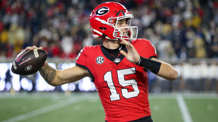 Nov 25, 2023; Atlanta, Georgia, USA; Georgia Bulldogs quarterback Carson Beck (15) warms up on the sideline against the Georgia Tech Yellow Jackets in the second half at Bobby Dodd Stadium at Hyundai Field. Mandatory Credit: Brett Davis-USA TODAY Sports Nov 25, 2023; Atlanta, Georgia, USA; Georgia Bulldogs quarterback Carson Beck (15) warms up on the sideline against the Georgia Tech Yellow Jackets in the second half at Bobby Dodd Stadium at Hyundai Field. Mandatory Credit: Brett Davis-USA TODAY Sports