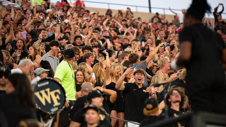 Wake Forest students celebrate during the North Carolina State game. After three games, which players or units are you celebrating, and which are you wanting to sell? 