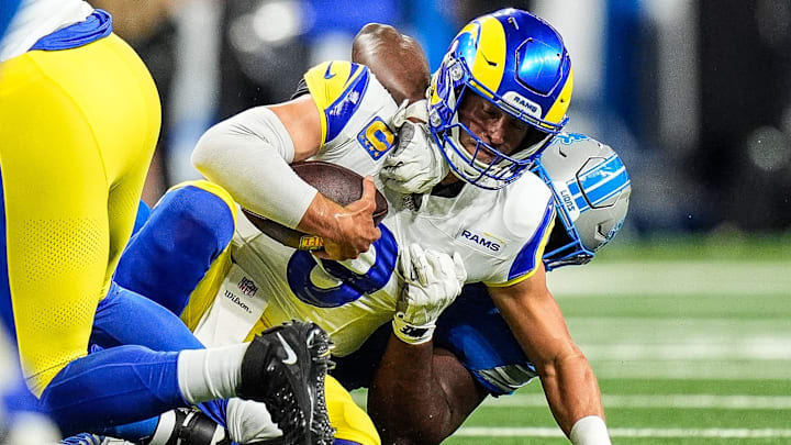 Los Angeles Rams quarterback Matthew Stafford (9) is sacked by Detroit Lions defensive end Levi Onwuzurike (91) during the first half at Ford Field in Detroit on Sunday, September 8, 2024. Los Angeles Rams quarterback Matthew Stafford (9) is sacked by Detroit Lions defensive end Levi Onwuzurike (91) during the first half at Ford Field in Detroit on Sunday, September 8, 2024.