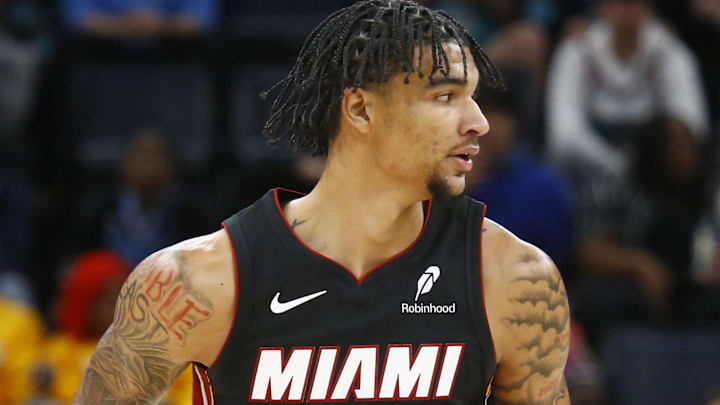 Oct 18, 2024; Memphis, Tennessee, USA; Miami Heat center Kel'el Ware (7) gets back on defense after a basket during the second half at FedExForum. Mandatory Credit: Petre Thomas-Imagn Images