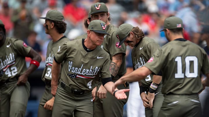 Vanderbilt Commodores head coach Tim Corbin (4) shakes hands with his players during introductions as Ole Miss Rebels take on Vanderbilt Commodores during the SEC baseball tournament championship game at Hoover Met in Birmingham, Ala., on Sunday, May 25, 2025.