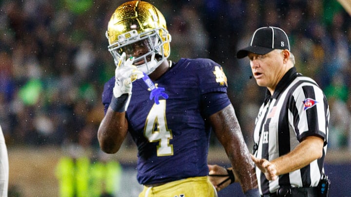 Notre Dame RB Jeremiyah Love celebrates after getting a first down in the second half of an NCAA football game against USC.