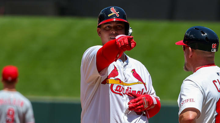 St. Louis Cardinals catcher Yohel Pozo celebrates against the Cincinnati Reds. St. Louis Cardinals catcher Yohel Pozo celebrates against the Cincinnati Reds.