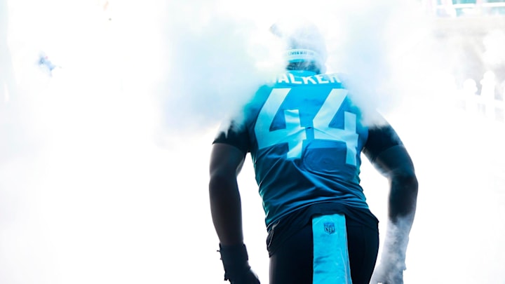Jacksonville Jaguars linebacker Travon Walker (44) takes to the field through the tunnel-