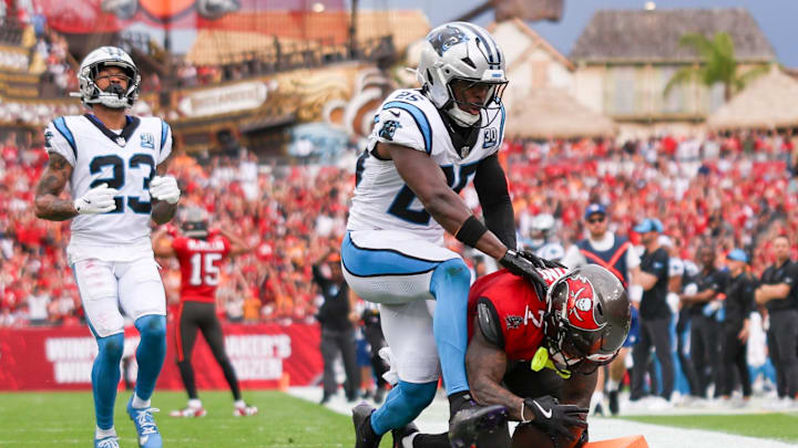 Dec 29, 2024; Tampa, Florida, USA; Tampa Bay Buccaneers running back Bucky Irving (7) scores a touchdown against the Carolina Panthers in the second quarter at Raymond James Stadium. Mandatory Credit: Nathan Ray Seebeck-Imagn Images