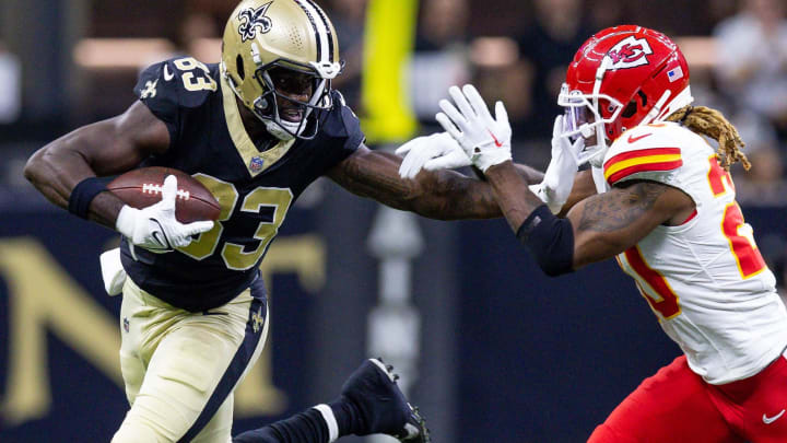 New Orleans Saints tight end Juwan Johnson (83) evades Kansas City Chiefs safety Justin Reid (20) after a reception New Orleans Saints tight end Juwan Johnson (83) evades Kansas City Chiefs safety Justin Reid (20) after a reception