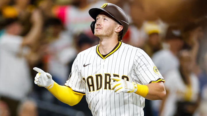Sep 13, 2025; San Diego, California, USA; San Diego Padres pitch hitter Bryce Johnson (29) celebrates after hitting a two-run home run during the eighth inning against the Colorado Rockies at Petco Park. Mandatory Credit: David Frerker-Imagn Images