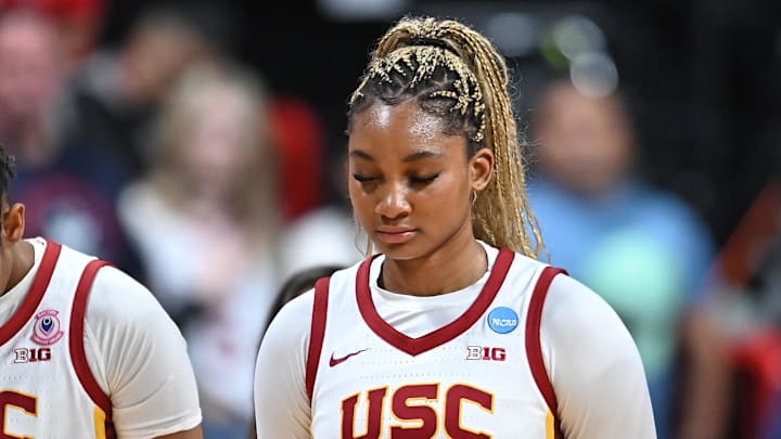 Mar 31, 2025; Spokane, WA, USA; USC Trojans forward Kiki Iriafen (44) stands for the National Anthem before a Elite 8 NCAA Tournament game against the UConn Huskies at Spokane Arena. Mandatory Credit: James Snook-Imagn Images