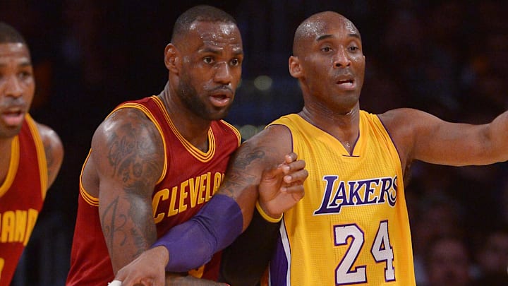 Mar 10, 2016; Los Angeles, CA, USA; Cleveland Cavaliers forward LeBron James (23) and Los Angeles Lakers forward Kobe Bryant (24) battle for position in the first quarter of the game at Staples Center. Mandatory Credit: Jayne Kamin-Oncea-Imagn Images