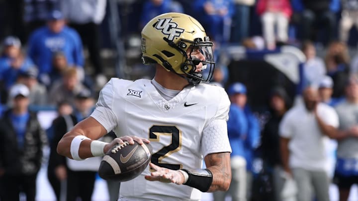 Nov 29, 2025; Provo, Utah, USA; UCF Knights quarterback Tayven Jackson (2) passes against the UCF Knights during the second quarter at LaVell Edwards Stadium. Mandatory Credit: Rob Gray-Imagn Images