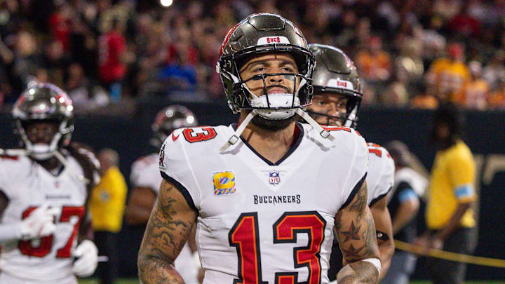 Oct 13, 2024; New Orleans, Louisiana, USA;  Tampa Bay Buccaneers wide receiver Mike Evans (13) runs on the field agains the New Orleans Saints during the first half at Caesars Superdome. Mandatory Credit: Stephen Lew-Imagn Images