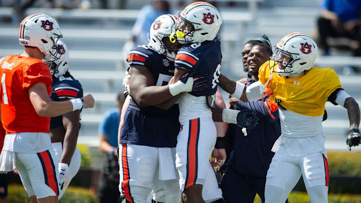 Auburn Tigers wide receiver Cam Coleman (8) celebrates his touchdown catch during the A-Day spring