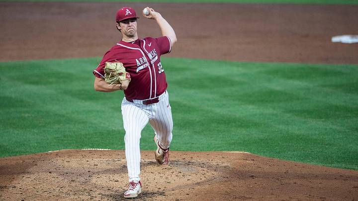Arkansas Razorbacks' Hunter Dietz (32) pitches the ball as Auburn Tigers take on Arkansas Razorbacks at Plainsman Park in Auburn, Ala. on Friday, April 3, 2026. Arkansas Razorbacks' Hunter Dietz (32) pitches the ball as Auburn Tigers take on Arkansas Razorbacks at Plainsman Park in Auburn, Ala. on Friday, April 3, 2026.