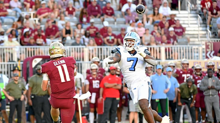 Nov 2, 2024; Tallahassee, Florida, USA; Florida State Seminoles quarterback Brock Glenn (11) throws a pass against the North Carolina Tarheels in the third quarter at Doak S. Campbell Stadium. Mandatory Credit: Robert Myers-Imagn Images