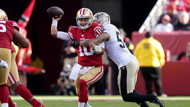 Nov 27, 2022; Santa Clara, California, USA; San Francisco 49ers quarterback Jimmy Garoppolo (10) is Nov 27, 2022; Santa Clara, California, USA; San Francisco 49ers quarterback Jimmy Garoppolo (10) is