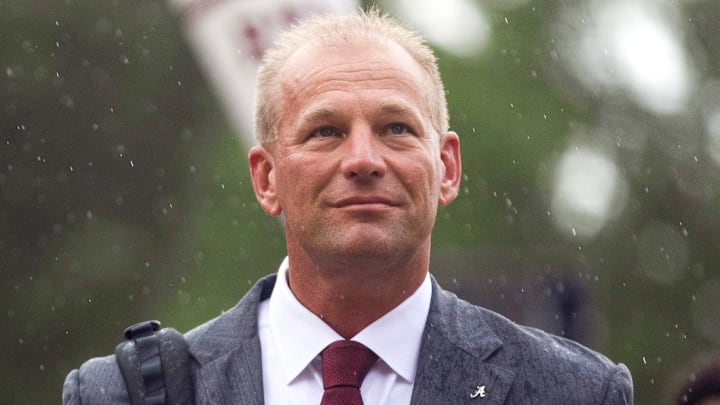 Aug 31, 2024; Tuscaloosa, Alabama, USA;  Fans watch as Alabama Crimson Tide head coach Kalen DeBoer walks down the Walk of Champions with his team outside of Bryant-Denny Stadium. Mandatory Credit: Will McLelland-Imagn Images