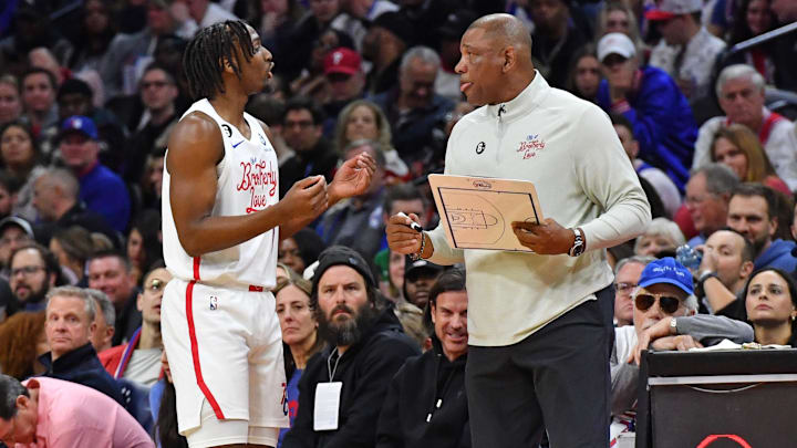 Feb 25, 2023; Philadelphia, Pennsylvania, USA; Philadelphia 76ers guard Tyrese Maxey (0) and head coach Doc Rivers against the Boston Celtics at Wells Fargo Center. Mandatory Credit: Eric Hartline-Imagn Images