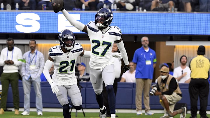 Nov 19, 2023; Inglewood, California, USA; Seattle Seahawks cornerback Riq Woolen (27) celebrates making an interception against the Los Angeles Rams in the fourth quarter at SoFi Stadium. Nov 19, 2023; Inglewood, California, USA; Seattle Seahawks cornerback Riq Woolen (27) celebrates making an interception against the Los Angeles Rams in the fourth quarter at SoFi Stadium.