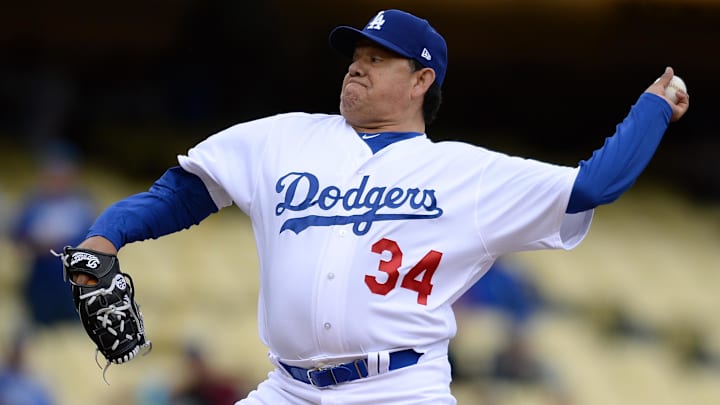 May 12, 2018; Los Angeles, CA, USA; Los Angeles Dodgers former player Fernando Valenzuela throws a pitch during the Dodgers Alumni game before a game between the Dodgers and the Cincinnati Reds at Dodger Stadium. Mandatory Credit: Orlando Ramirez-Imagn Images