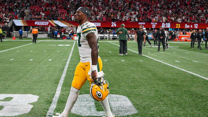 Sep 17, 2023; Atlanta, Georgia, USA; Green Bay Packers running back Patrick Taylor (27) walks off the field after a loss against the Atlanta Falcons at Mercedes-Benz Stadium. Mandatory Credit: Brett Davis-Imagn Images