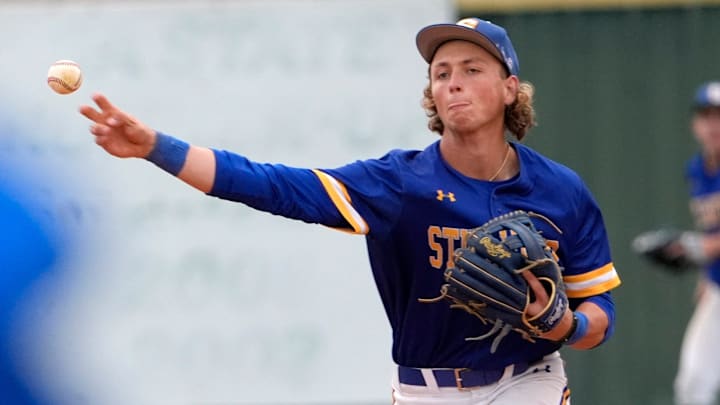 Stillwater's Ethan Holliday throws to first for an out during the high school baseball game between Fort Cobb-Broxton and Stillwater at Edmond Santa Fe High School in Edmond, Okla., Friday, April, 18, 2025.