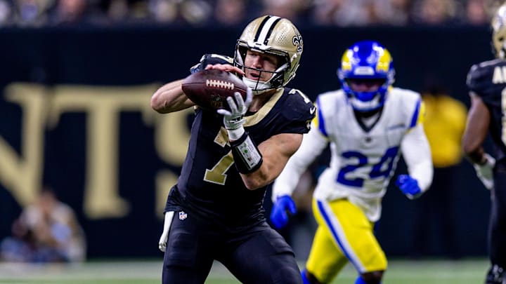 Dec 1, 2024; New Orleans, Louisiana, USA;  New Orleans Saints tight end Taysom Hill (7) catches a pass against the Los Angeles Rams during the first half at Caesars Superdome. Mandatory Credit: Stephen Lew-Imagn Images