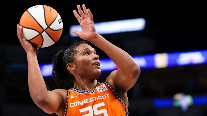 Oct 1, 2024; Minneapolis, Minnesota, USA; Connecticut Sun forward Alyssa Thomas (25) shoots against the Minnesota Lynx during the second half of game two of the 2024 WNBA Semi-finals at Target Center. Mandatory Credit: Matt Krohn-Imagn Images