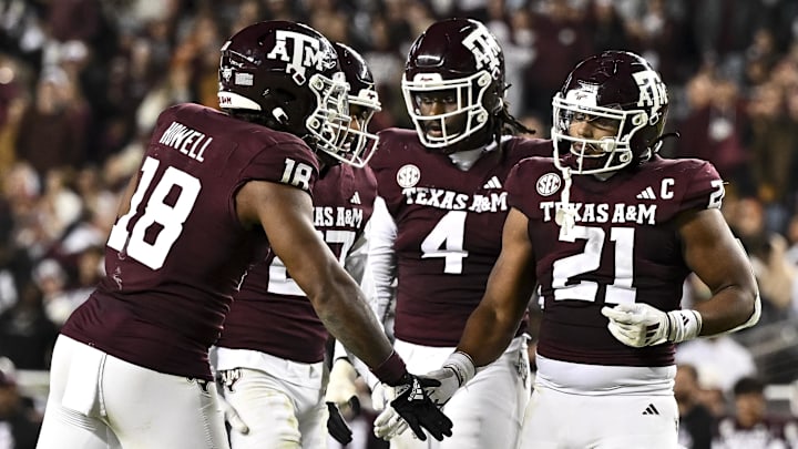 Texas A&M Aggies linebacker Taurean York (21) reacts against the Texas Longhorns during the second half. The Longhorns defeated the Aggies 17-7 at Kyle Field. 