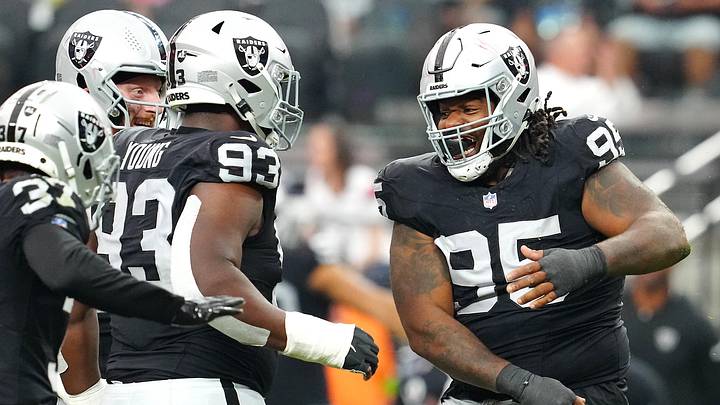 Oct 15, 2023; Paradise, Nevada, USA; Las Vegas Raiders defensive tackle John Jenkins (95) celebrates after getting a sack against the New England Patriots during the third quarter at Allegiant Stadium. Mandatory Credit: Stephen R. Sylvanie-USA TODAY Sports Oct 15, 2023; Paradise, Nevada, USA; Las Vegas Raiders defensive tackle John Jenkins (95) celebrates after getting a sack against the New England Patriots during the third quarter at Allegiant Stadium. Mandatory Credit: Stephen R. Sylvanie-USA TODAY Sports