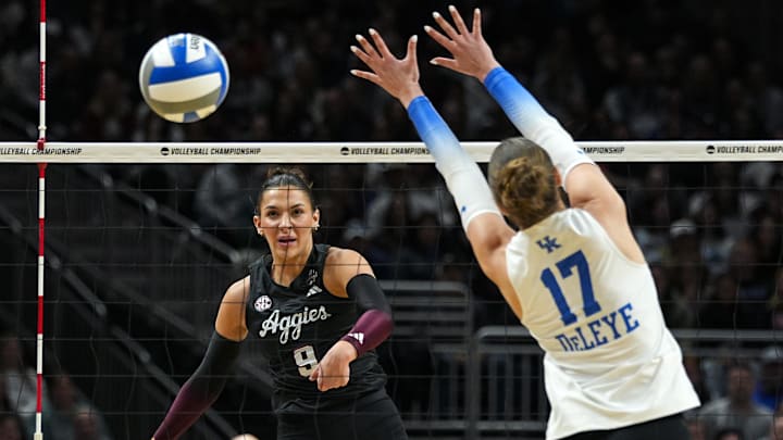Dec 21, 2025; Kansas City, MO, USA; Texas A&M Aggies opposite Logan Lednicky (9) hits the ball against Kentucky Wildcats outside hitter Brooklyn Deleye (17) during the first set in the 2025 NCAA Women’s Volleyball Championship at T-Mobile Center. Mandatory Credit: Jay Biggerstaff-Imagn Images