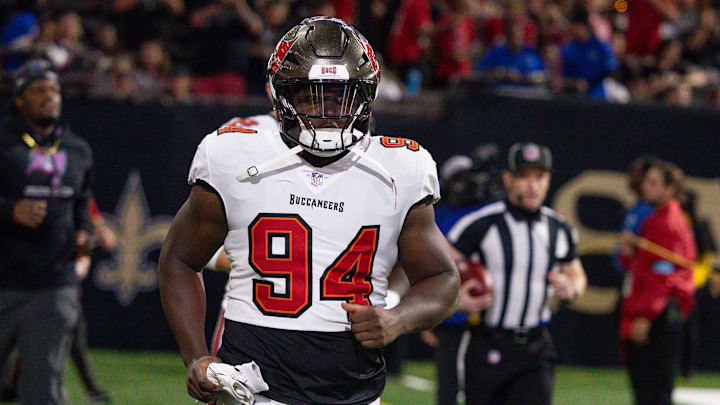 Oct 13, 2024; New Orleans, Louisiana, USA;  Tampa Bay Buccaneers defensive tackle Calijah Kancey (94) run on the field against the New Orleans Saints during the first half at Caesars Superdome. Mandatory Credit: Stephen Lew-Imagn Images
