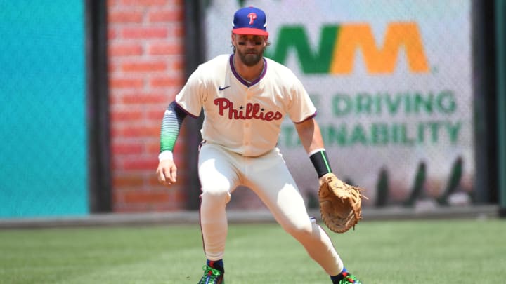 Jul 14, 2024; Philadelphia, Pennsylvania, USA; Philadelphia Phillies first baseman Bryce Harper (3) fields a groundball during the first inning against the Oakland Athletics at Citizens Bank Park. Jul 14, 2024; Philadelphia, Pennsylvania, USA; Philadelphia Phillies first baseman Bryce Harper (3) fields a groundball during the first inning against the Oakland Athletics at Citizens Bank Park.
