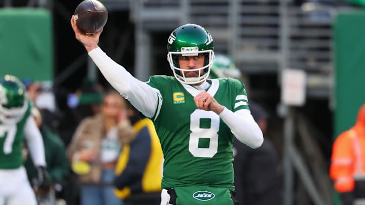 Jan 5, 2025; East Rutherford, New Jersey, USA; New York Jets quarterback Aaron Rodgers (8) throws a pass during pregame warmups for their game against the Miami Dolphins at MetLife Stadium. Mandatory Credit: Ed Mulholland-Imagn Images