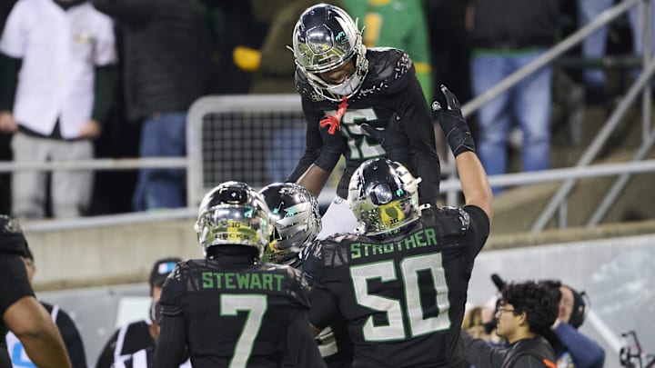 Nov 30, 2024; Eugene, Oregon, USA; Oregon Ducks wide receiver Tez Johnson (15) celebrates catching a touchdown pass during the second half against the Washington Huskies at Autzen Stadium. Mandatory Credit: Troy Wayrynen-Imagn Images