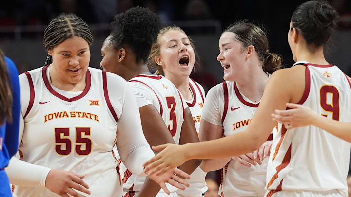 Iowa State Cyclones' center Audi Crooks (55), forward Alisa Williams (3), guard Emily Ryan (11), forward Addy Brown (24) and center Lilly Taulelei (9) celebrate after defensive stop Kansas Jayhawks' during the fourth quarter in the NCAA women’s basketball Big-12 conference home opening at Hilton Coliseum on Wednesday, Jan. 1, 2025, in Ames, Iowa.
