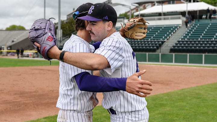Holly Cross pitcher Danny Macchiarola (right) celebrates with a teammate after a win against Army on May 18 at Fitton Field.